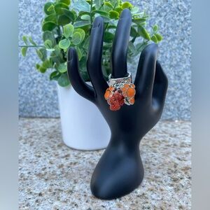 Paw Print Stretch Ring.  Silver Tone With 8 Orange Colored Charms In Total. New.